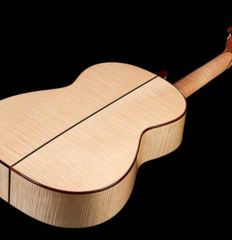 This is the maple back of a 2022 German Vazquez Rubio classical guitar model "Concert 635" made with a spruce soundboard.
