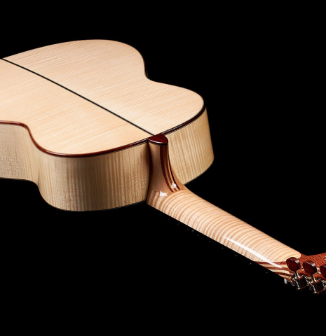This is the maple back of a 2022 German Vazquez Rubio classical guitar model "Concert 635" made with a spruce soundboard.