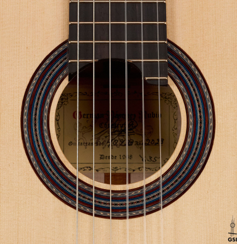 This is the rosette of a 2023 German Vazquez Rubio "Concert 635" classical guitar made with spruce top and maple back and sides