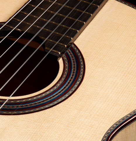 This is the rosette and soundboard of a 2023 German Vazquez Rubio "Concert 635" classical guitar made with spruce top and maple back and sides