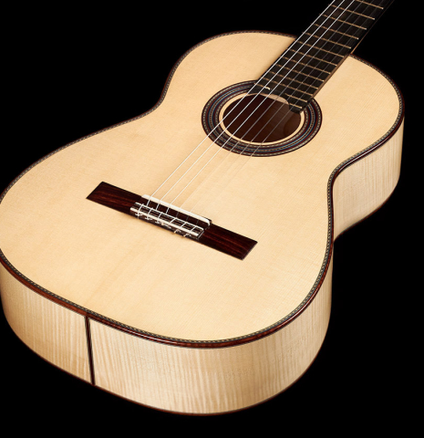 This is the front and soundboard of a 2023 German Vazquez Rubio "Concert 635" classical guitar made with spruce top and maple back and sides