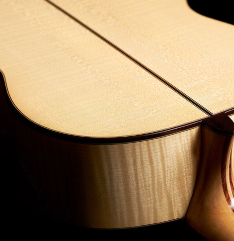 This is the maple back and sides of a 2023 German Vazquez Rubio "Concert 635" classical guitar made with spruce top and maple back and sides