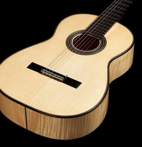 This is the front and soundboard of a 2023 German Vazquez Rubio "Concert 635" classical guitar made with spruce top and maple back and sides