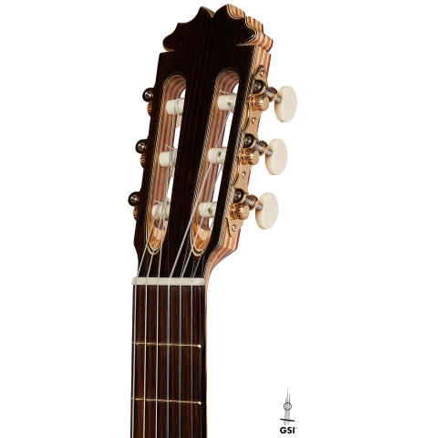 The headstock of a 2025 German Vazquez Rubio "Concert 635" classical guitar made of spruce and maple