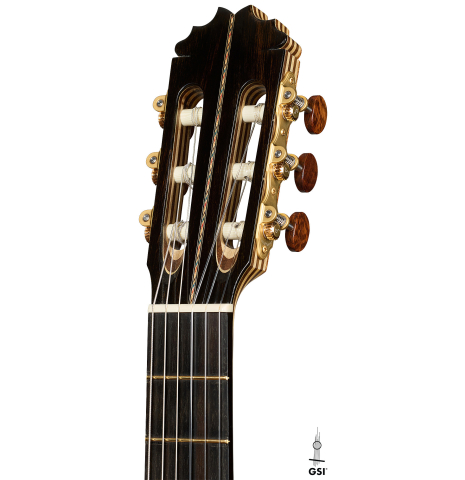 The headstock of a 2026 German Vazquez Rubio "Concert 635" classical guitar made of spruce and maple