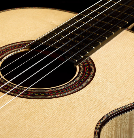The soundboard and rosette of a 2026 German Vazquez Rubio "Concert 635" classical guitar made of spruce and maple