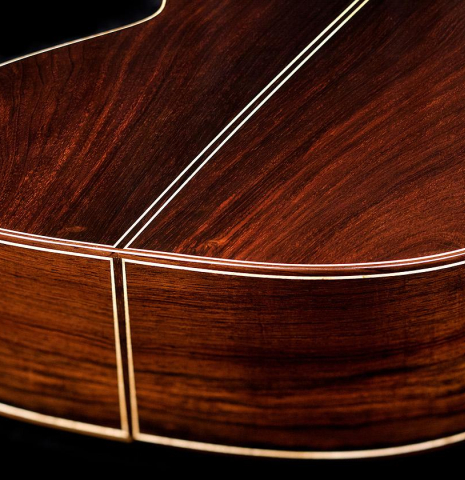The back and sides of a 2018 German Vazquez Rubio "Concert 635" classical guitar made with spruce and CSA rosewood.