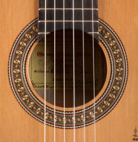 The rosette of a 2021 German Vazquez Rubio "Divina" classical guitar made with cedar and palo escrito