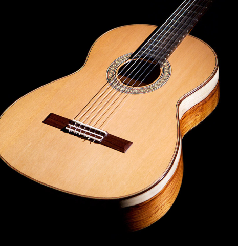 The soundboard and sides of a 2021 German Vazquez Rubio "Divina" classical guitar made with cedar and palo escrito