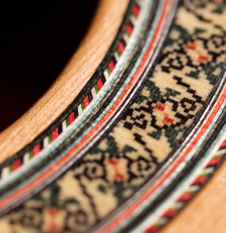 Detail of the rosette of a 2021 German Vazquez Rubio "Divina" classical guitar made with cedar and palo escrito