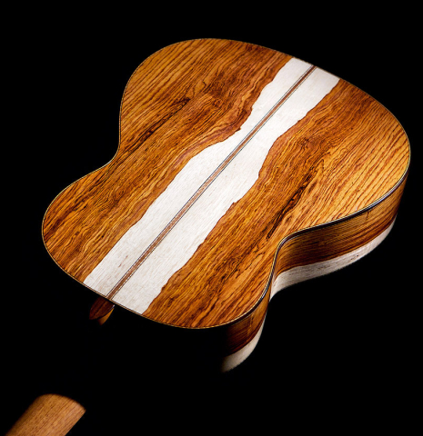 The back and sides of a 2021 German Vazquez Rubio "Divina" classical guitar made with cedar and palo escrito
