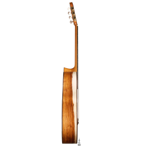The side of a 2021 German Vazquez Rubio "Divina" classical guitar made with cedar and palo escrito