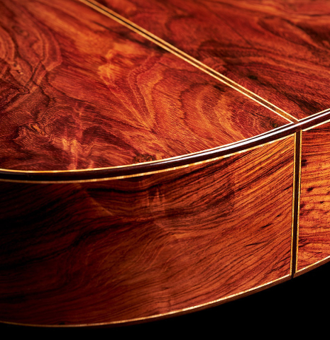 The back and sides at the foot of a 2024 German Vazquez Rubio "Divina" classical guitar made of cedar and palo escrito