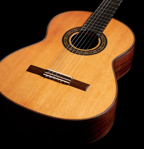 The soundboard of a 2024 German Vazquez Rubio "Divina" classical guitar made of cedar and palo escrito