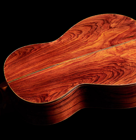 The back and sides of a 2024 German Vazquez Rubio "Divina" classical guitar made of cedar and palo escrito