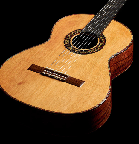 The soundboard of a 2024 German Vazquez Rubio "Divina" classical guitar made of cedar and palo escrito