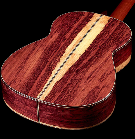 The back and sides of a 2022 German Vazquez Rubio "Divina" classical guitar made with spruce and Palo Escrito