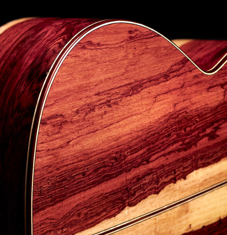 The back and sides of a 2022 German Vazquez Rubio "Divina" classical guitar made with spruce and Palo Escrito