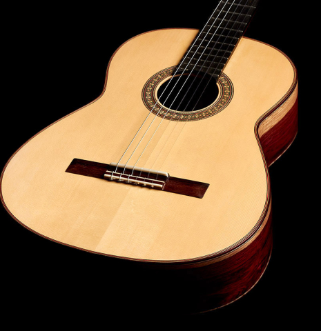 The spruce top of a 2022 German Vazquez Rubio "Divina" classical guitar with Palo Escrito back and sides