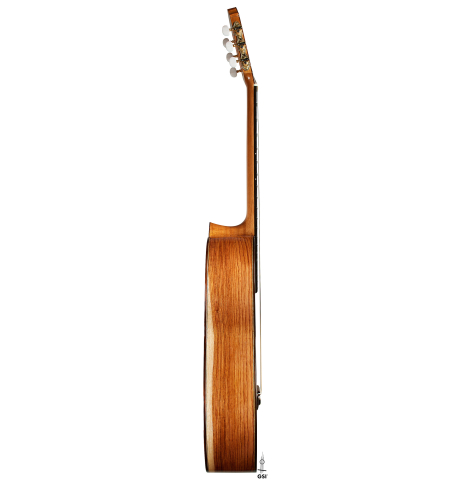 The side of a 2024 German Vazquez Rubio "Divina" classical guitar made of spruce and palo escrito