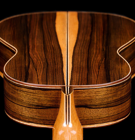 The back and neck of a 2021 German Vazquez Rubio "Concert 635" classical guitar made of spruce and ziricote