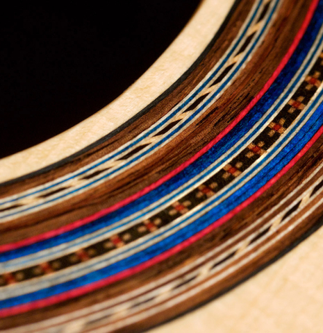 The rosette of a 2021 German Vazquez Rubio "Concert 635" classical guitar made of spruce and ziricote