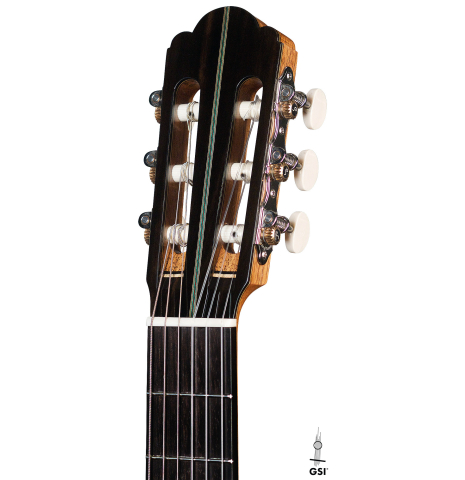 The headstock and machine heads of a 2021 German Vazquez Rubio "Hauser" classical guitar made of spruce and cocobolo