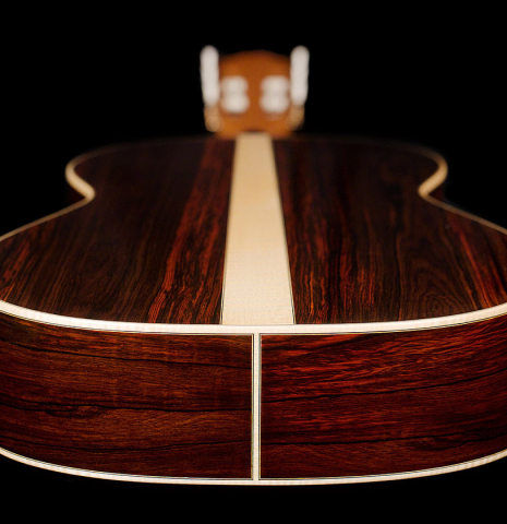 The back and sides of a 2021 German Vazquez Rubio "Hauser" classical guitar made of spruce and cocobolo
