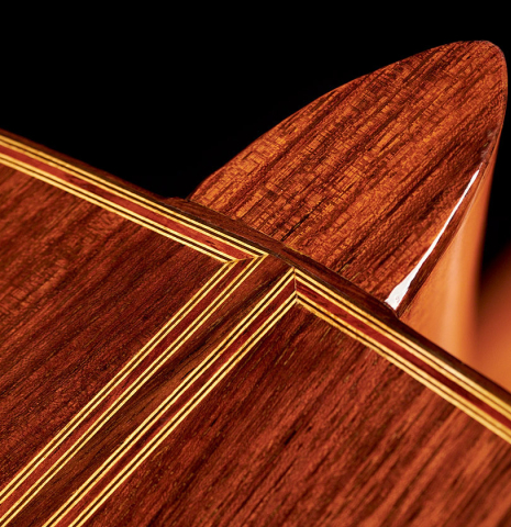 The back and heel of a 1969 David Rubio classical guitar made of spruce and Indian rosewood