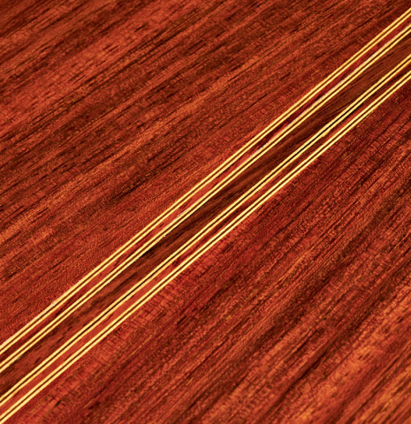 The back of a 1969 David Rubio classical guitar made of spruce and Indian rosewood