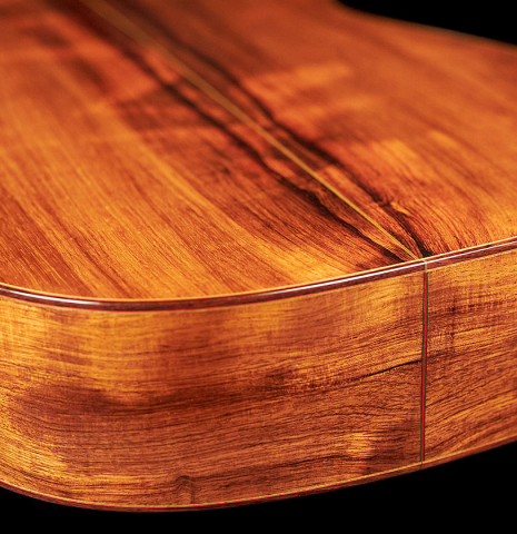 The lower bout of a 1999 German Vazquez Rubio "640" classical guitar made with cedar and palo escrito
