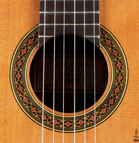 The rosette of a 1999 German Vazquez Rubio "640" classical guitar made with cedar and palo escrito