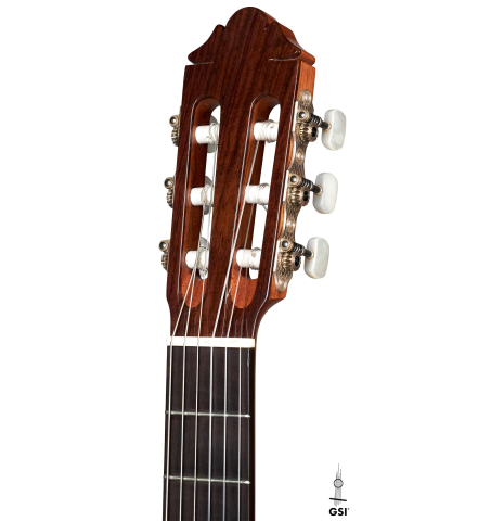 The headstock of a 1999 German Vazquez Rubio "640" classical guitar made with cedar and palo escrito