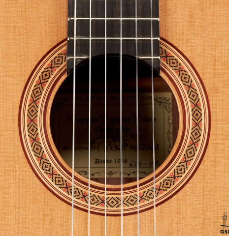 The rosette of a 2023 German Vazquez Rubio "Classic Estudio 48" classical guitar made of cedar and palo escrito