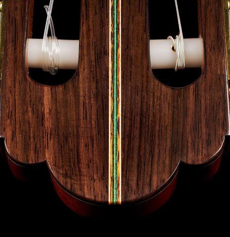 The headstock veneer and purfling of a 2024 German Vazquez Rubio "Hauser" classical guitar made of spruce and Indian rosewood