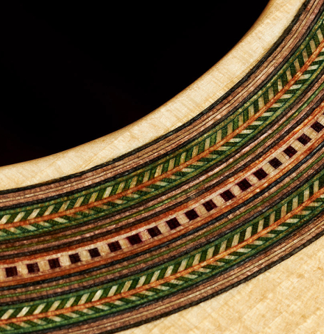 Close-up detail of the rosette of a 2024 German Vazquez Rubio "Hauser" classical guitar made of spruce and Indian rosewood