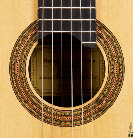 The rosette of a 2024 German Vazquez Rubio "Hauser" classical guitar made of spruce and CSA rosewood