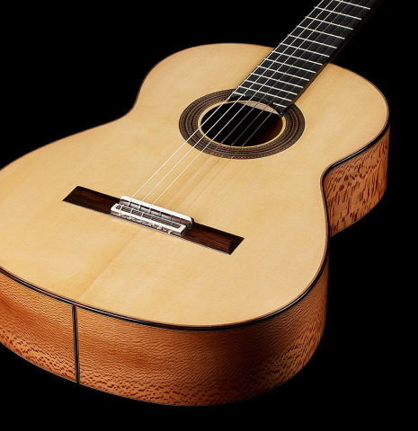 The soundboard of a 2024 German Vazquez Rubio "Solista" classical guitar made of spruce and Brazilian lacewood