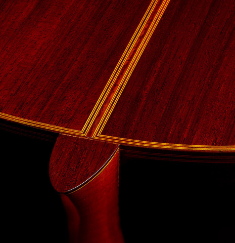 The heel, back binding and purfling of a 1969 David Rubio "PF" classical guitar made of spruce and CSA rosewood
