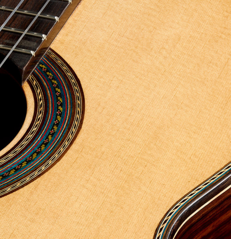 The soundboard and rosette detail of a 2025 German Vazquez Rubio "Solista 640" classical guitar made of spruce and Indian rosewood