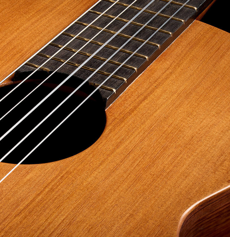 The soundboard and soundhole of a 2026 German Vazquez Rubio "Classic Estudio-SM" classical guitar made of cedar and palo escrito