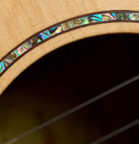 The soundhole and rosette detail of a 2026 German Vazquez Rubio "Classic Estudio-SM" classical guitar made of spruce and palo escrito