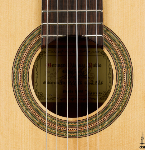 The rosette of a 2026 German Vazquez Rubio "Hauser" classical guitar made of spruce and palo escrito