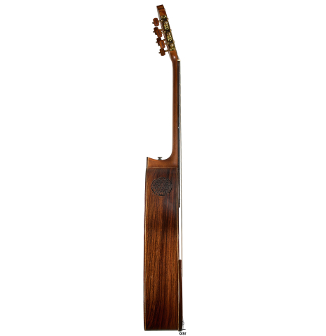 The side of a 2020 German Vazquez Rubio "Solista" classical guitar made of cedar and Indian rosewood