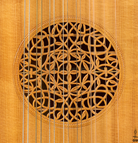 The "rose" rosette of a 1981 David Rubio 9-course lute made of spruce and maple