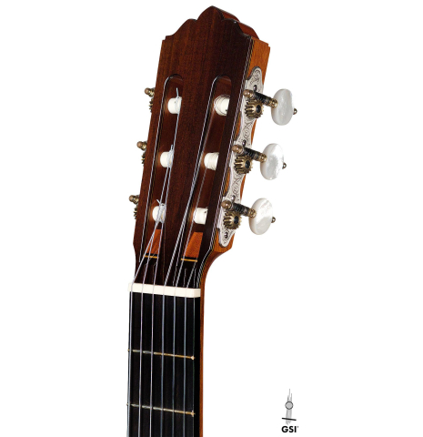 The headstock of a 2006 Robert Ruck classical guitar made of cedar and Indian rosewood