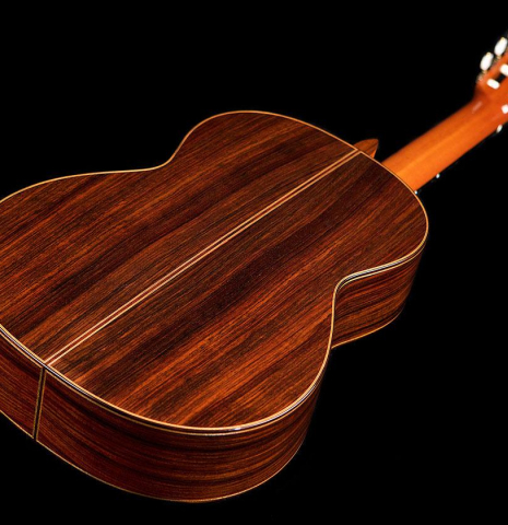 The back and sides of a 2006 Robert Ruck classical guitar made of cedar and Indian rosewood