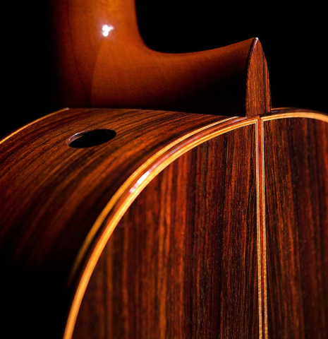 The sides, heel and back of a 2006 Robert Ruck classical guitar made of cedar and Indian rosewood