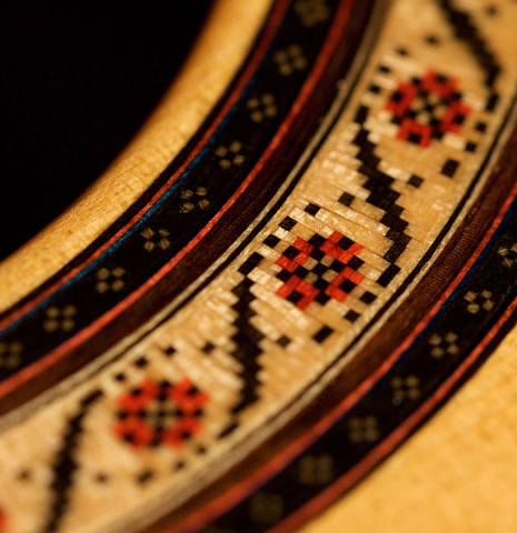 Detail of the rosette of a 1983 Robert Ruck classical guitar made of spruce and CSA rosewood Detail of the rosette of a 1983 Robert Ruck classical guitar made of spruce and CSA rosewood