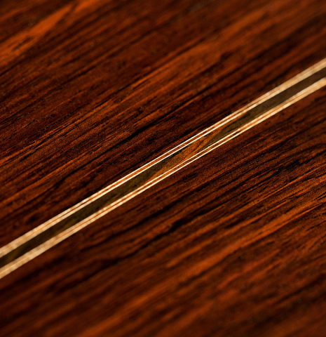 Detail of the back center seam of a 1983 Robert Ruck classical guitar made of spruce and CSA rosewood Detail of the back center seam of a 1983 Robert Ruck classical guitar made of spruce and CSA rosewood